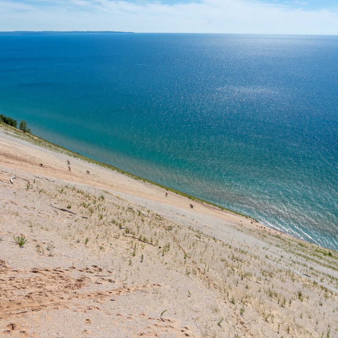 Discover Sleeping Bear Dunes National Lakeshore, its massive dunes, Manitou Islands, rich Native American history, and stunning Lake Michigan shoreline.