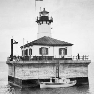 Fourteen Foot Shoal Lighthouse marks a shallow hazard in Lake Huron, guiding ships through a narrow, historic Great Lakes shipping channel.