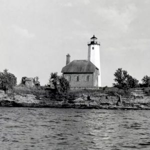 Isle Royale Light on Menagerie Island guided ships into Siskiwit Bay, reflecting the challenges of remote navigation on storm swept Lake Superior.