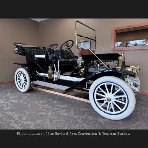 Restored 1911 Gaylord 30 touring car side view showing seating and body design in Gaylord Michigan. Photo courtesy of the Gaylord Area Convention & Tourism Bureau