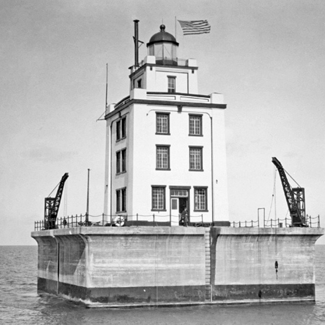 Poe Reef Lighthouse marks a dangerous shoal in the Straits of Mackinac, reflecting the shift from lightships to permanent offshore lights.