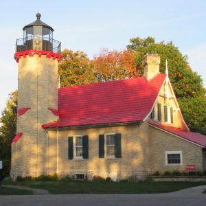 McGulpin Point Lighthouse guided ships through the Straits of Mackinac and today stands restored as a historic site and private aid to navigation.