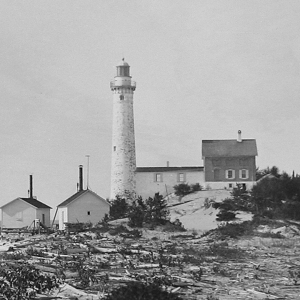 Explore the history of South Manitou Island Lighthouse, a towering beacon that guided ships through Lake Michigan's busy Manitou Passage for more than a century.